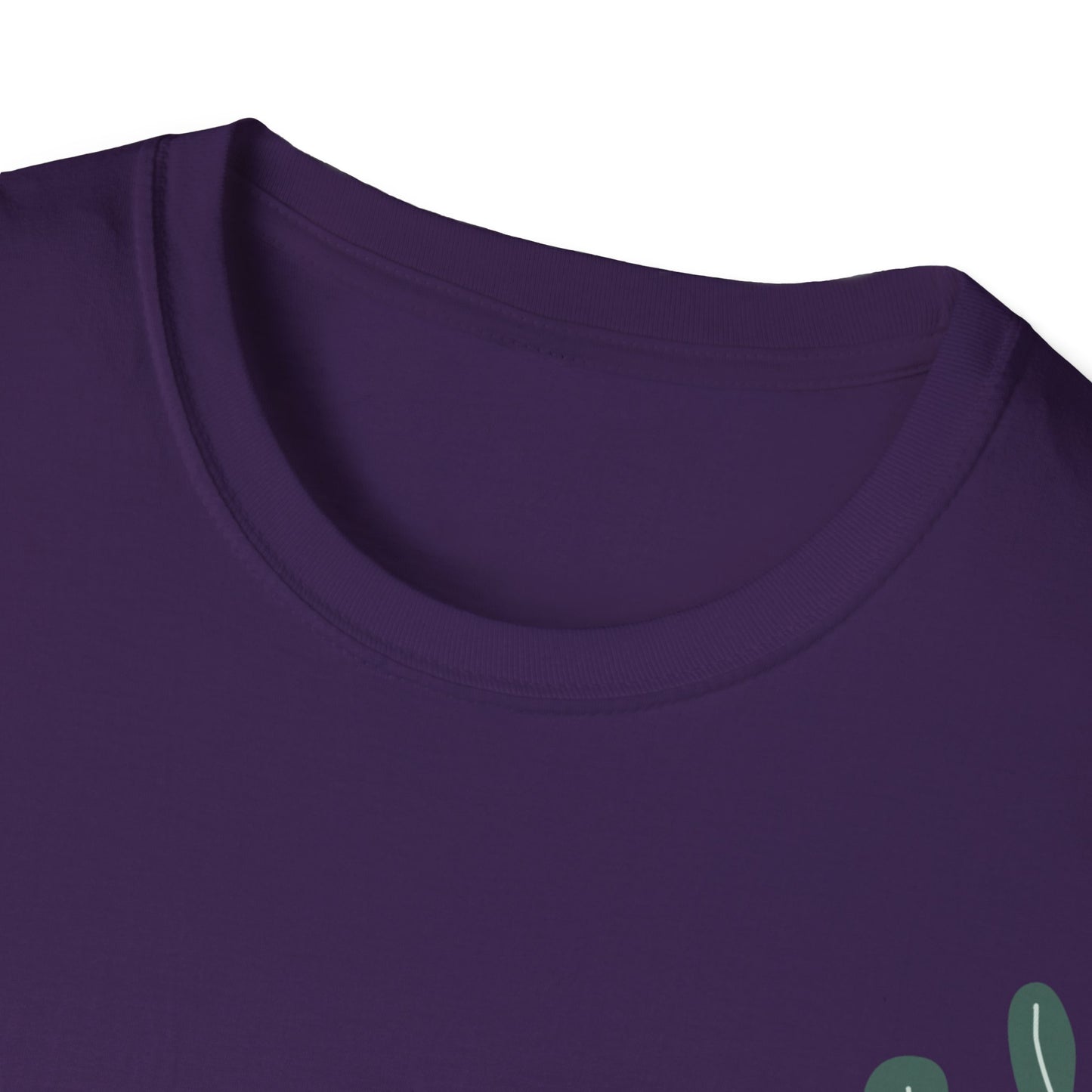 Close-up of a purple botanical shirt with a green design on a white background