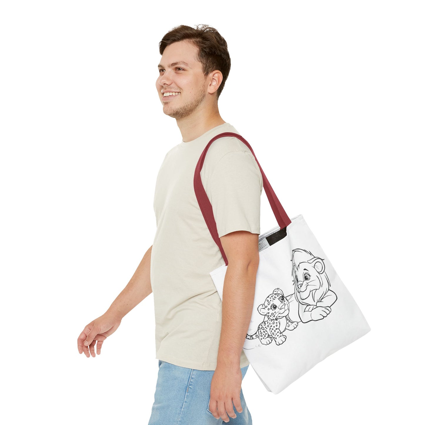 Man carrying a tote bag with a cartoon design on a white background