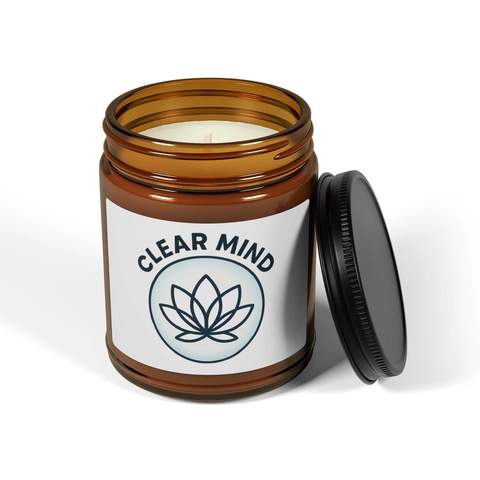Candle in an amber jar with a 'Clear Mind' label on a white background