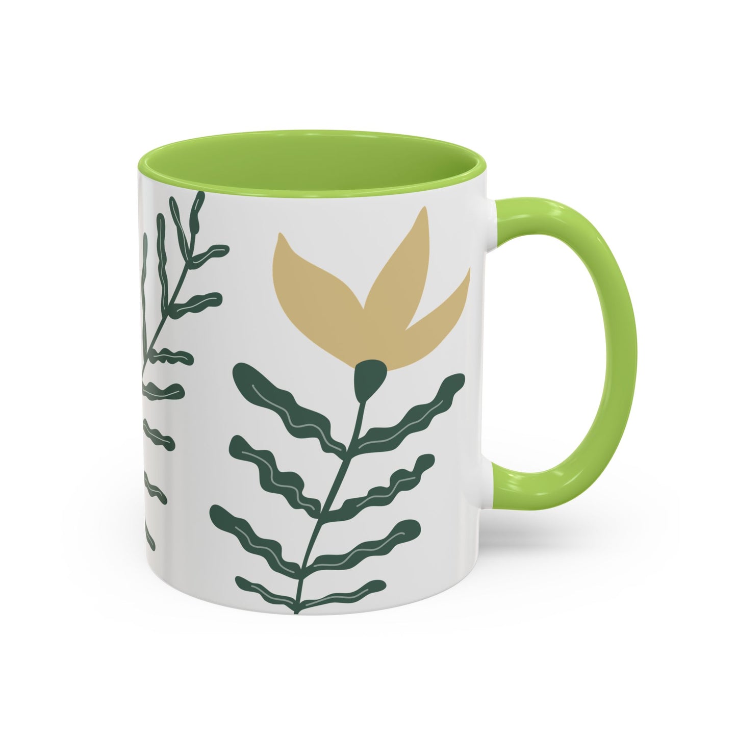 Mug with green interior and handle, featuring a leaf design on a white background