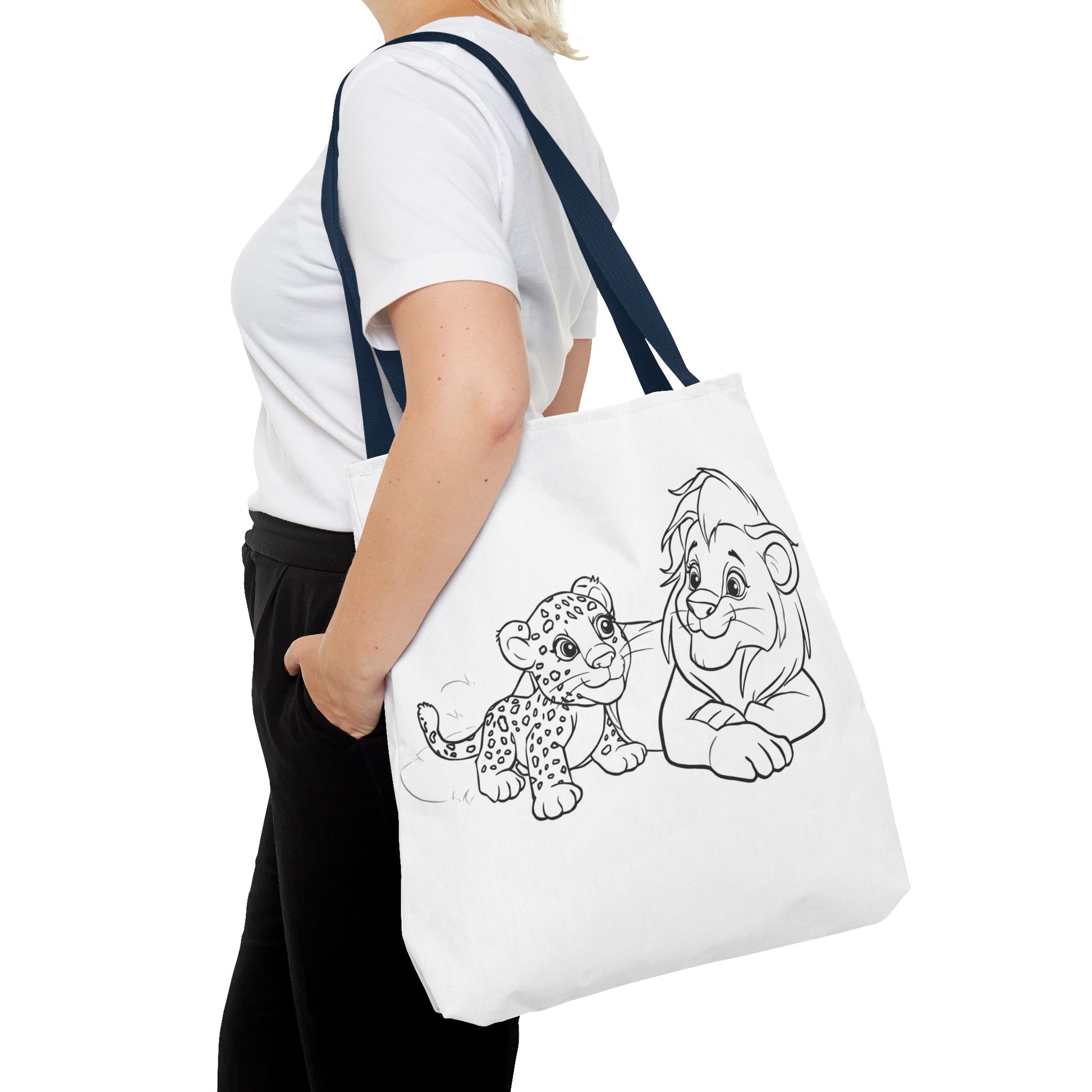 Person holding a tote bag with cartoon characters on a white background