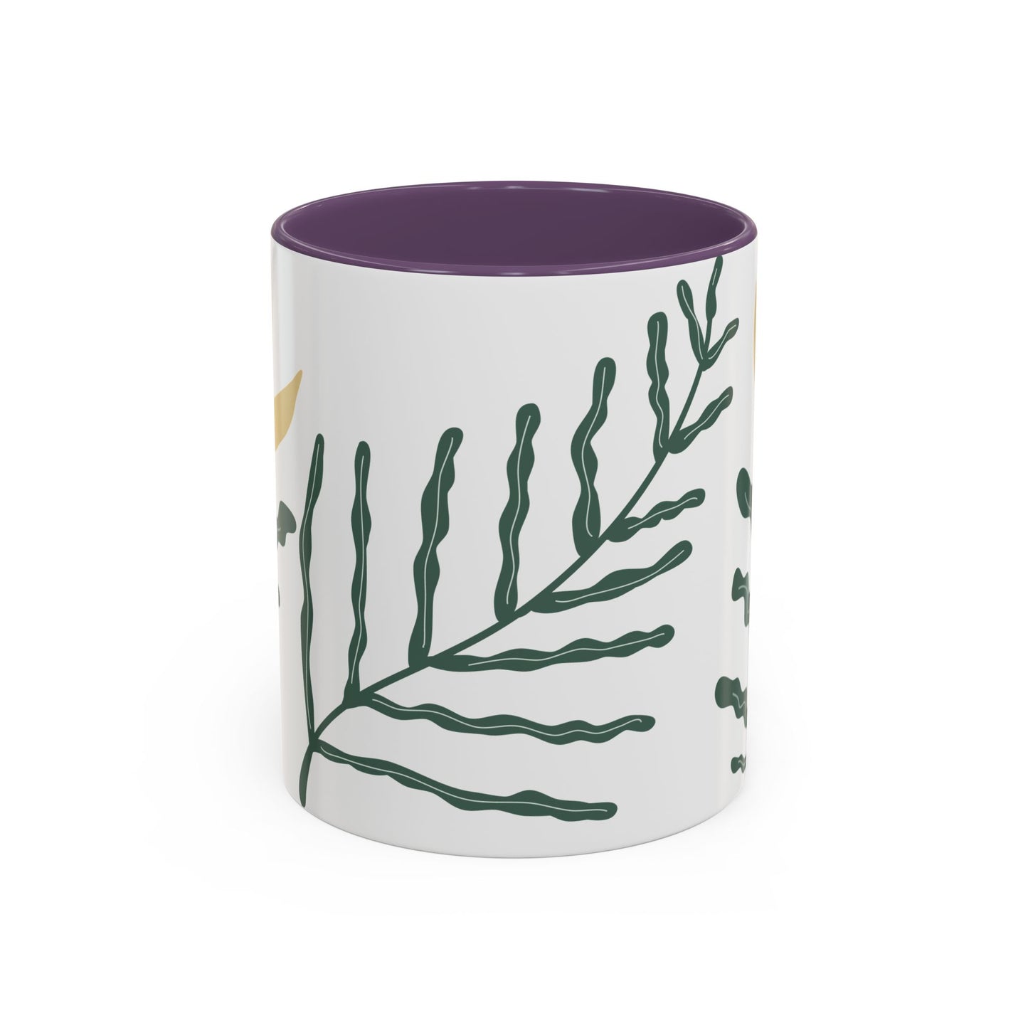 Mug with green leaf design and purple interior on a white background
