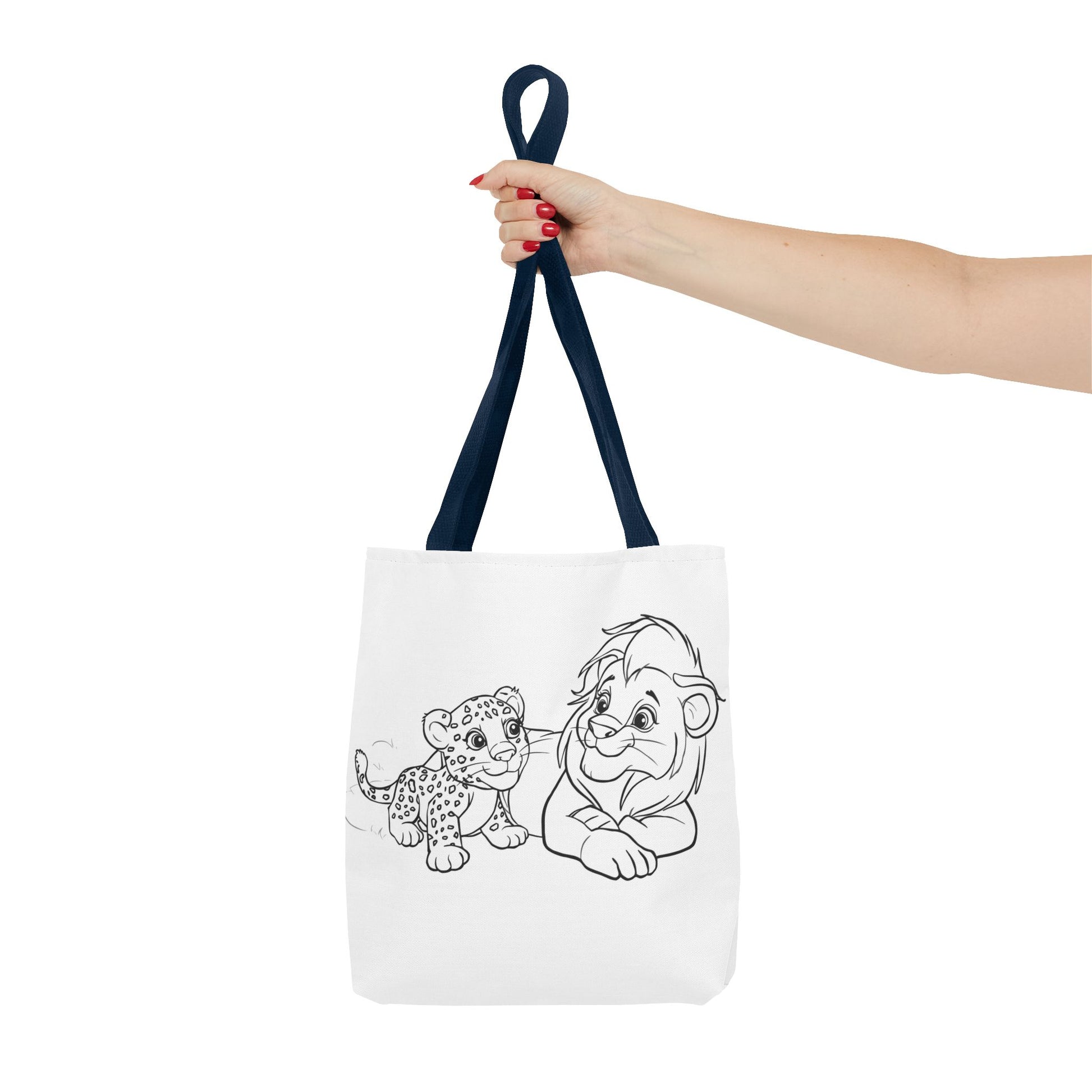Tote bag with cartoon characters held by a hand on a white background