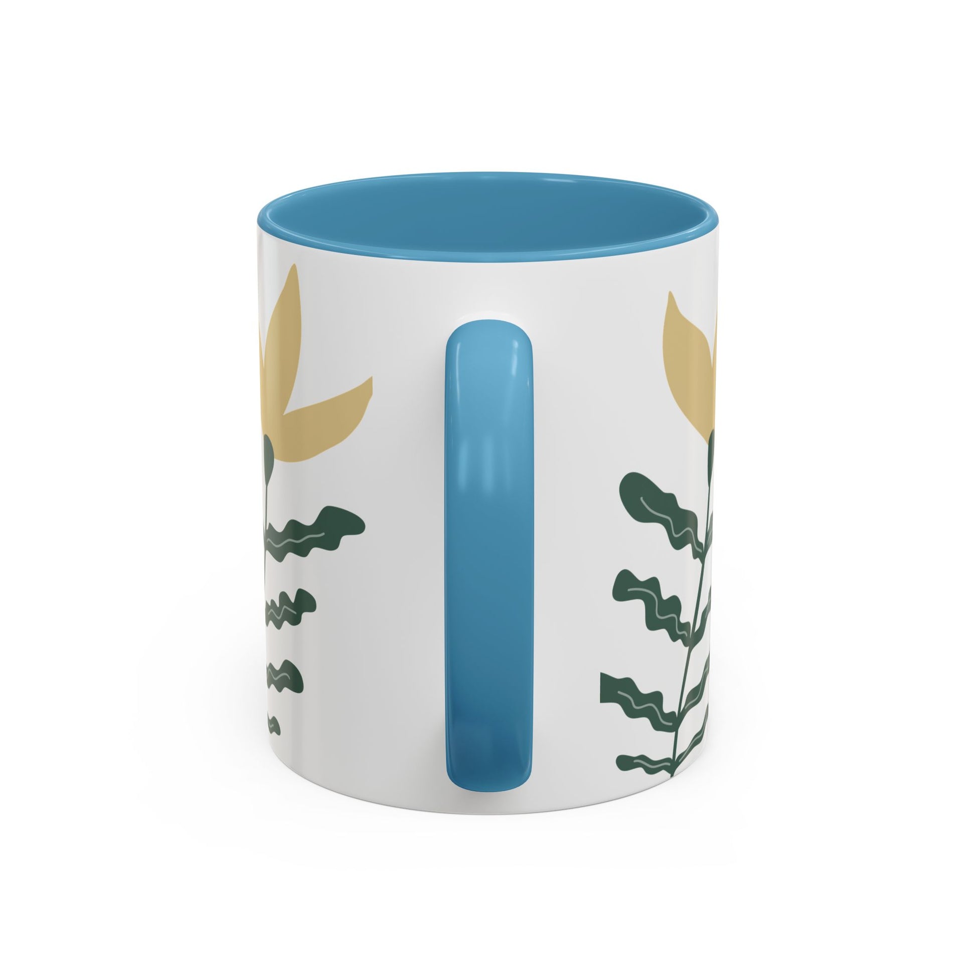 White mug with blue interior and handle, featuring leaf patterns on a white background
